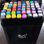 48 marcadores doble punta en bolso