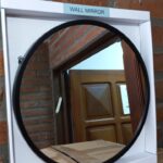 espejo con borde metalico